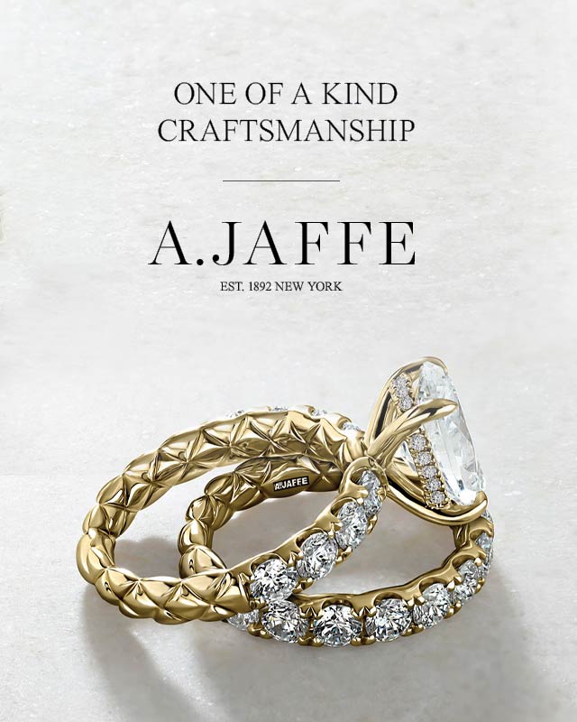 Gold and diamond ring with 'A. Jaffe' branding on a light background